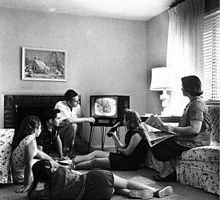 220px-Family_watching_television_1958